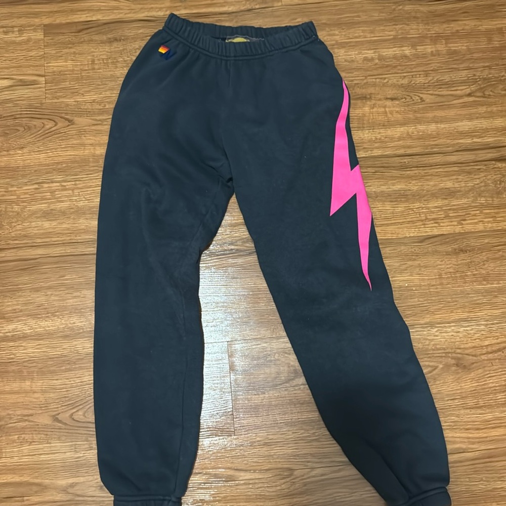 Aviator Nation Black Joggers with Pink Lightning Bolt